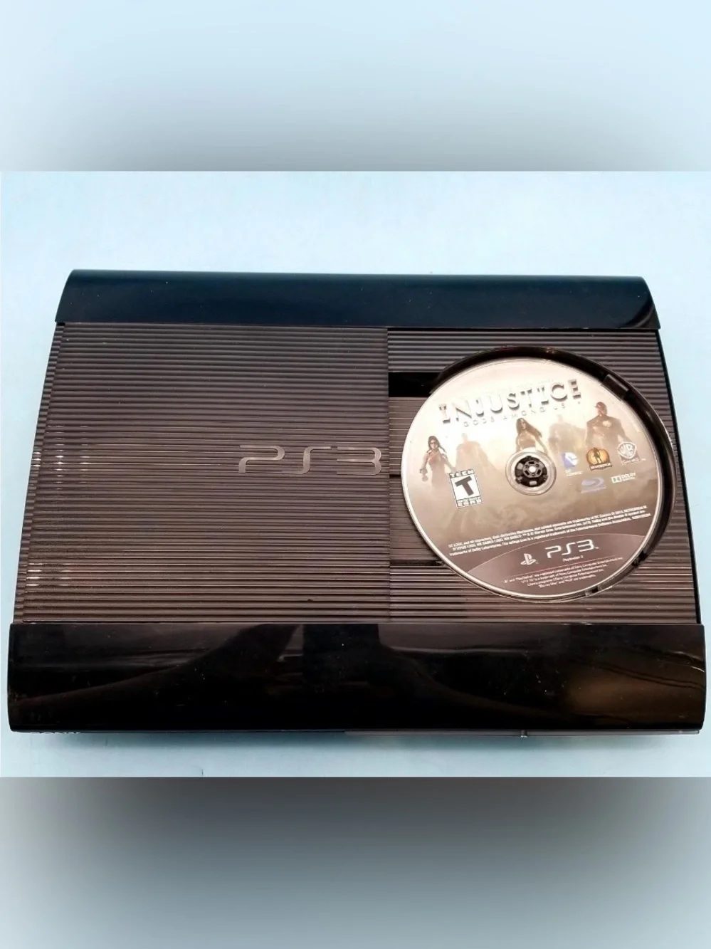 Sony PS3 Super Slim Console Bundle with Dual Controllers & 4 Games